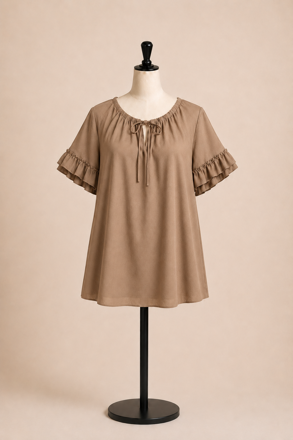 Maglia elegante maniche corte con volant e laccetto frontale
