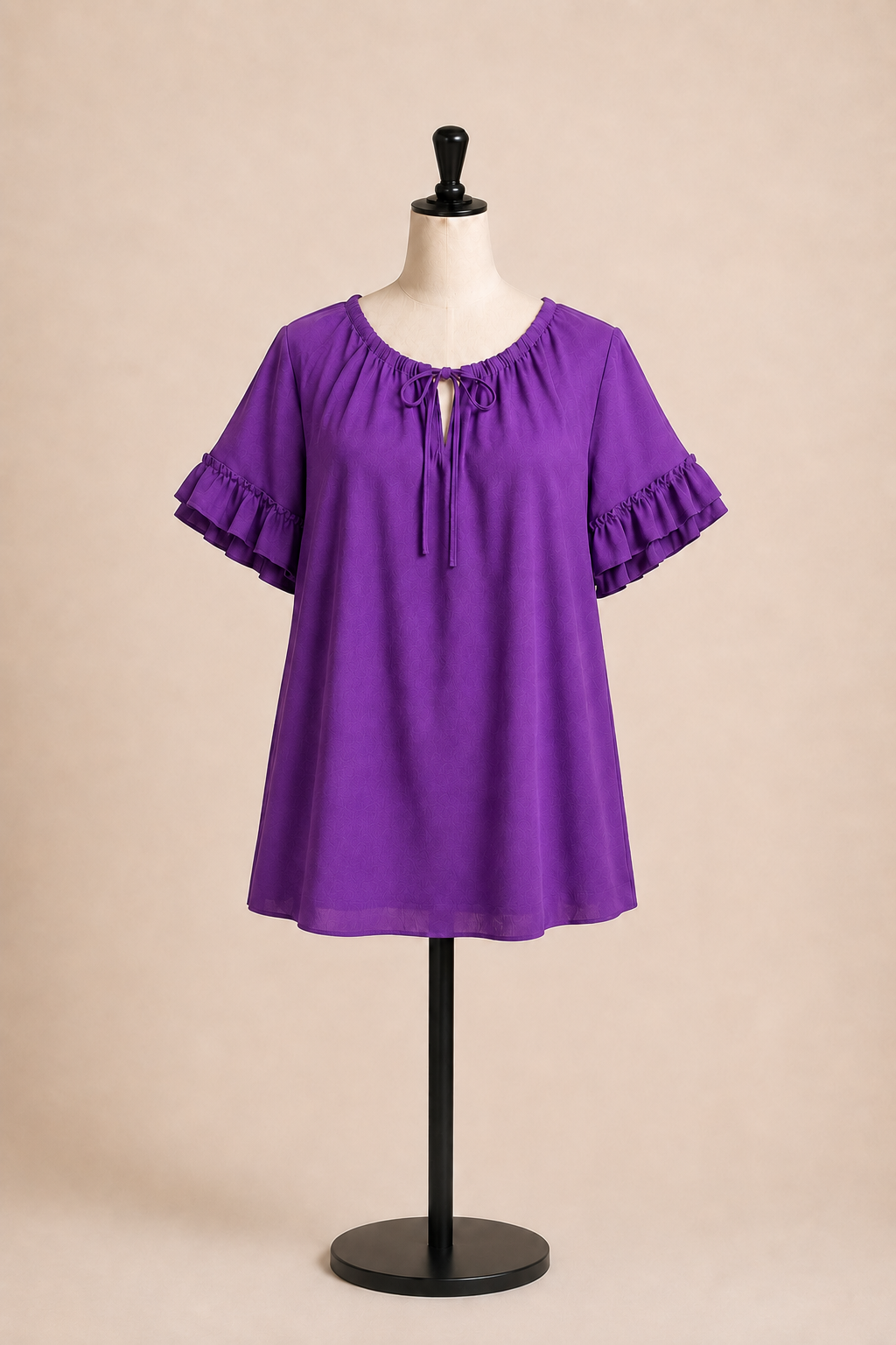 Maglia elegante maniche corte con volant e laccetto frontale